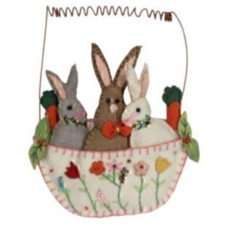 Why not add something special to your Easter decorations with this Felt Stitched Bunnies in a Basket Hanging Decoration by designer Gisela Graham. Featuring 3 different coloured Easter bunnies sitting in a basket with carrots and decorated with Spring flowers. This Easter decoration can be hung from the wire attached. Made from felt. Size: (LxWxD) 12.5x15x2.5cm